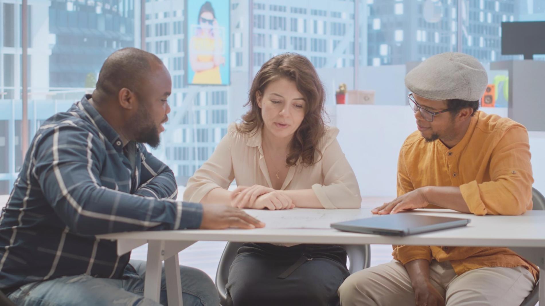 Students working collaboratively on financial analysis projects