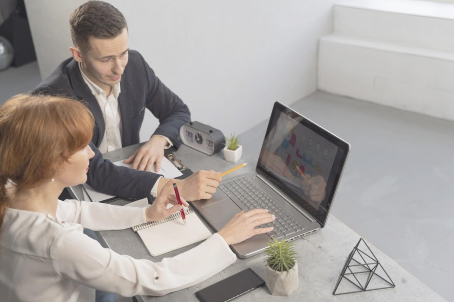Financial planning tools and educational resources displayed on desk